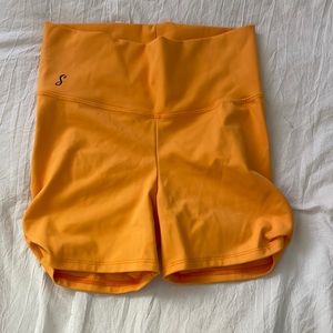 Soel dancewear mango orange biker shorts in size teen medium